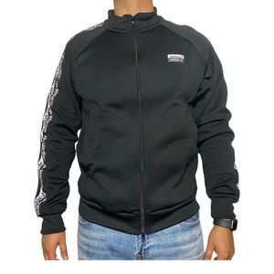 Black Adidas jacket with Adidas logo on the side o